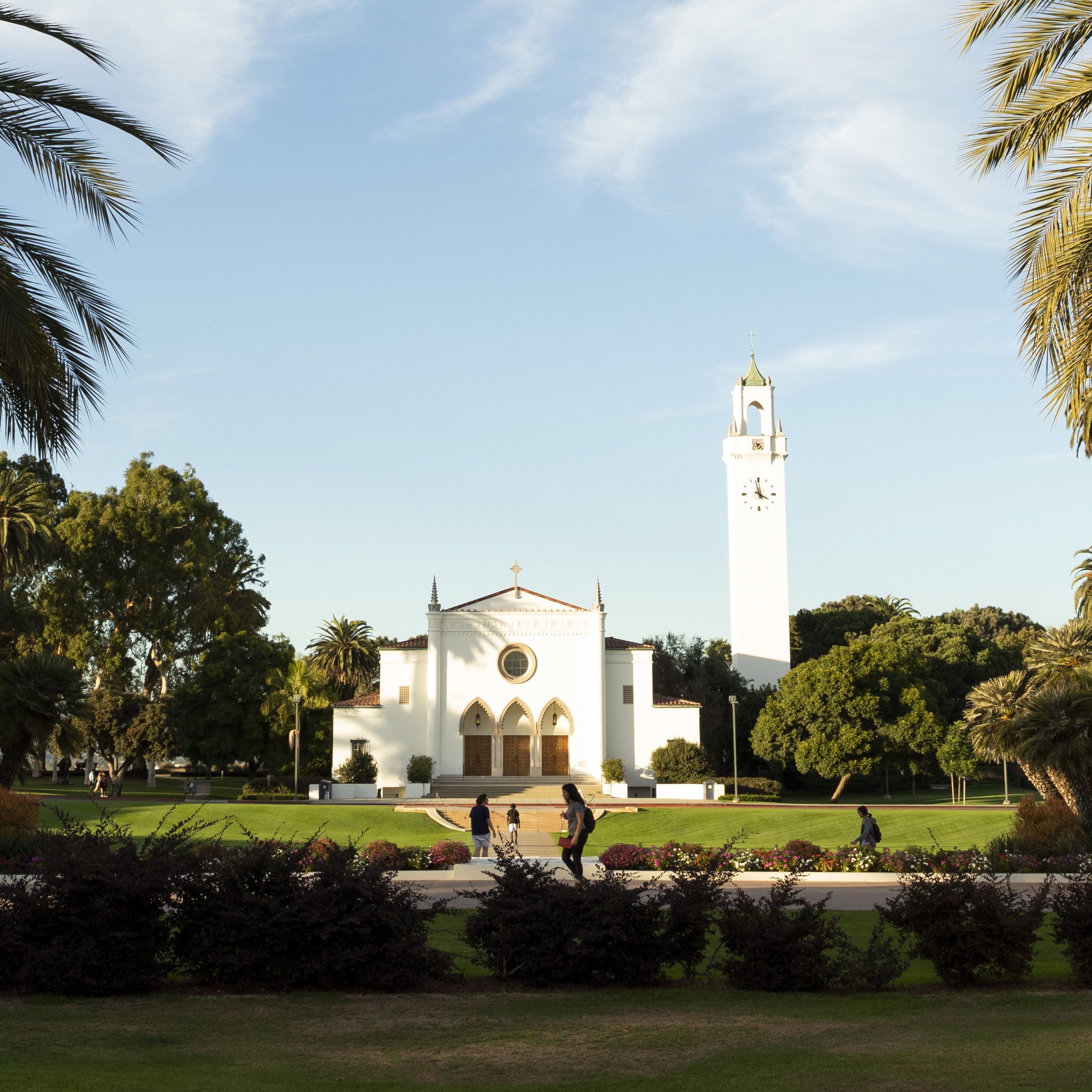 Chapel at sunset with large grass lawn